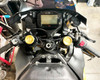 G-Force G-Force Top Triple Clamp Kit Suzuki GSXR1000 (17-25), motorcycle handlebar and instrument cluster view with yellow anodized clamps.