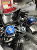 VooDoo Motorcycle Components VooDoo Top Triple Tree Complete Kit Suzuki GSXR1000 (17-26), installed on a motorcycle's handlebar area showing blue anodized components.