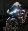 Schnitz Racing Schnitz LED Headlight Upgrade Kit Kawasaki ZX-14R (06-25), focused on the front of a black Kawasaki ZX-14R motorcycle with illuminated headlights, showcasing modern LED headlight upgrade for enhanced visibility and style.