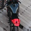Lo Pro Racing Alcantara Cut Seat GSXR1000 (17-25), top view of a sleek motorcycle with black and red accents, focusing on the Alcantara seat and aerodynamic design.