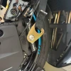 Brock’s Performance Motorcycle Parts Brocks Front End Lowering Strap Kit CFMOTO 675SS, close-up of the alloy strap fastened to the motorcycle's front end for lowering adjustment.