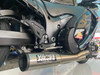 Vance & Hines Sidewinder Exhaust Suzuki Hayabusa (99-26), a close-up view of the aftermarket exhaust system installed on a Suzuki Hayabusa motorcycle, showcasing the dual pipes and branding.