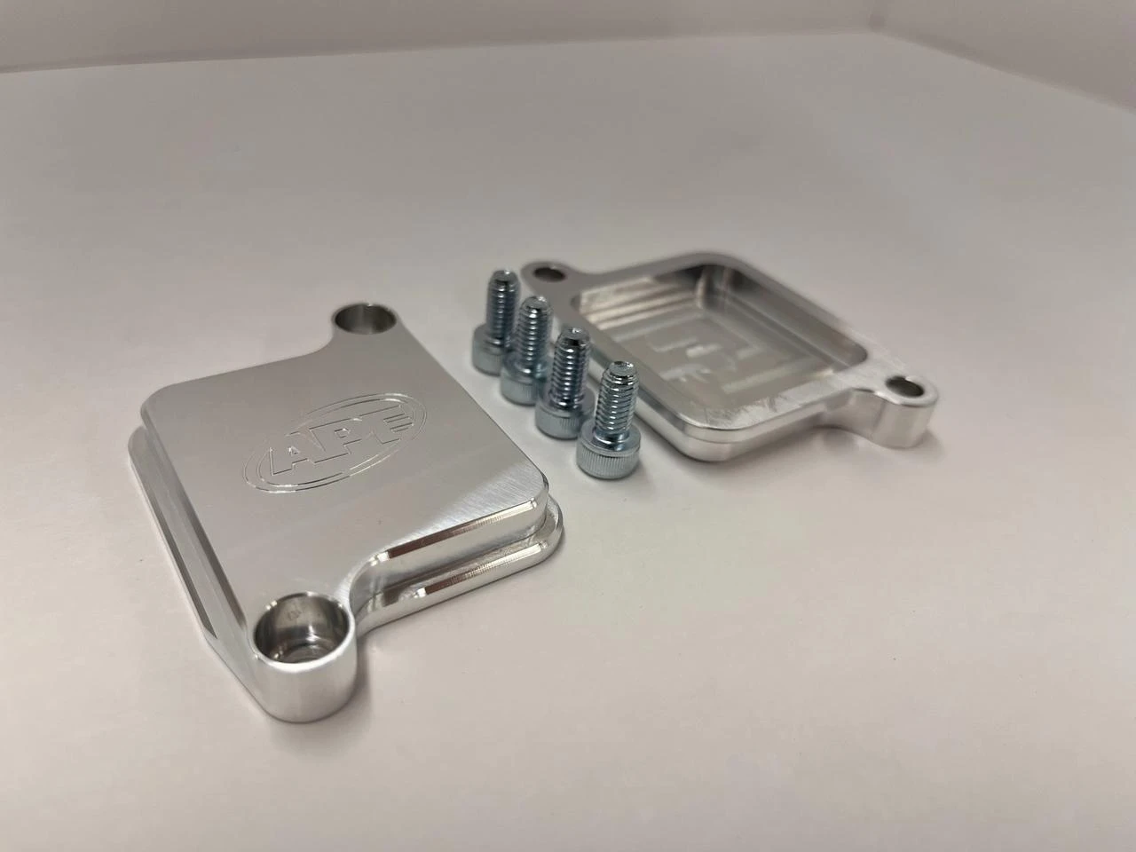 APEX Air Injection Block Off Plates Suzuki Hayabusa, metal plates with screws for installation.
