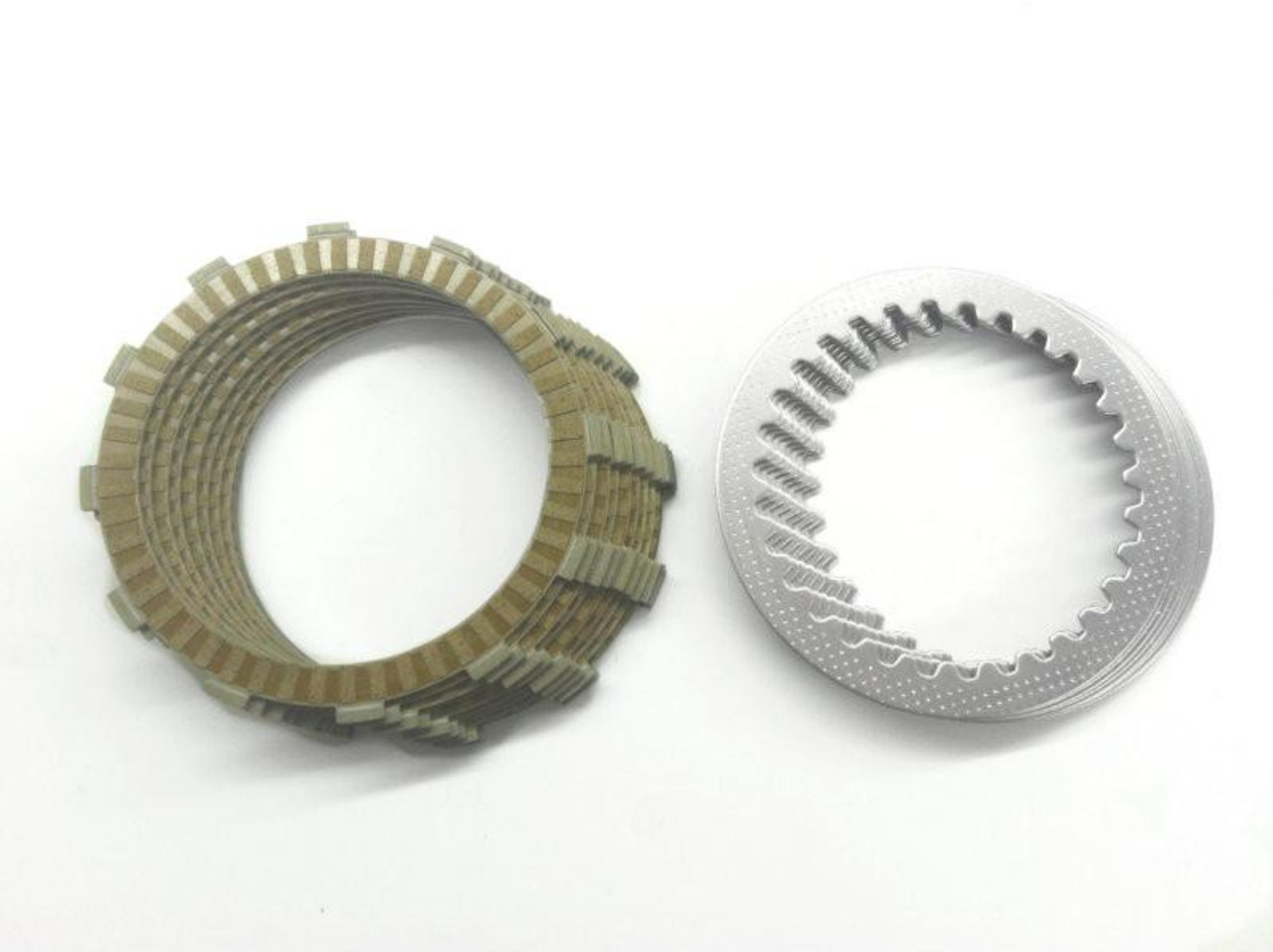 Kawasaki OEM Clutch Plate Kit Kawasaki ZX12 (00-05), image shows a set of clutch plates including friction plates and pressure plate.