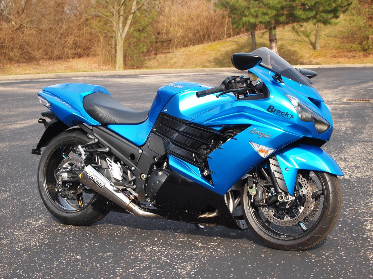 Brocks Performance Brocks Alien Head 2 Full Exhaust 14" Muffler Kawasaki ZX14R (12-25), blue sport motorcycle with aftermarket exhaust system in an outdoor parking lot.