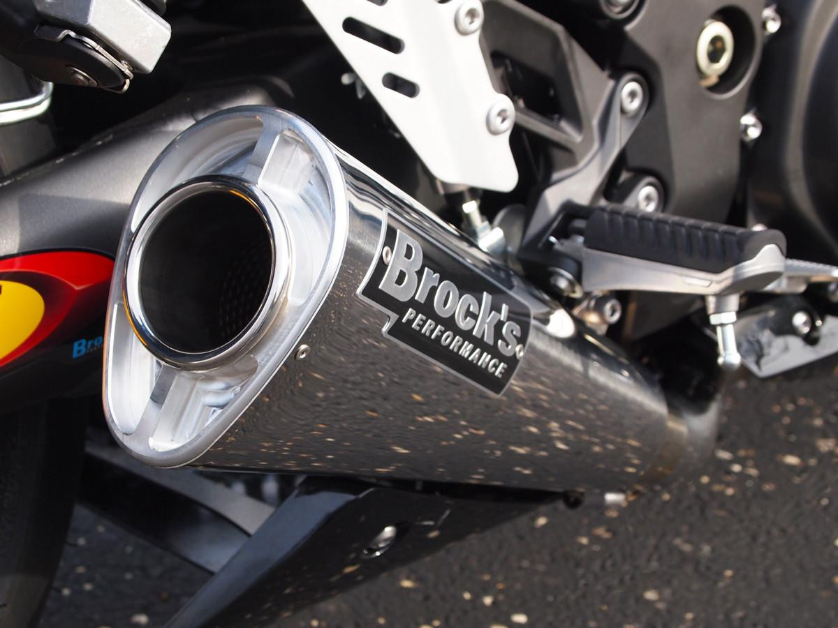 Brocks Performance Brocks Alien Head 2 Full Exhaust 14" Muffler Kawasaki ZX14R (12-25), close-up of a metallic motorcycle exhaust with the Brocks Performance branding, installed on a Kawasaki ZX14R motorcycle.