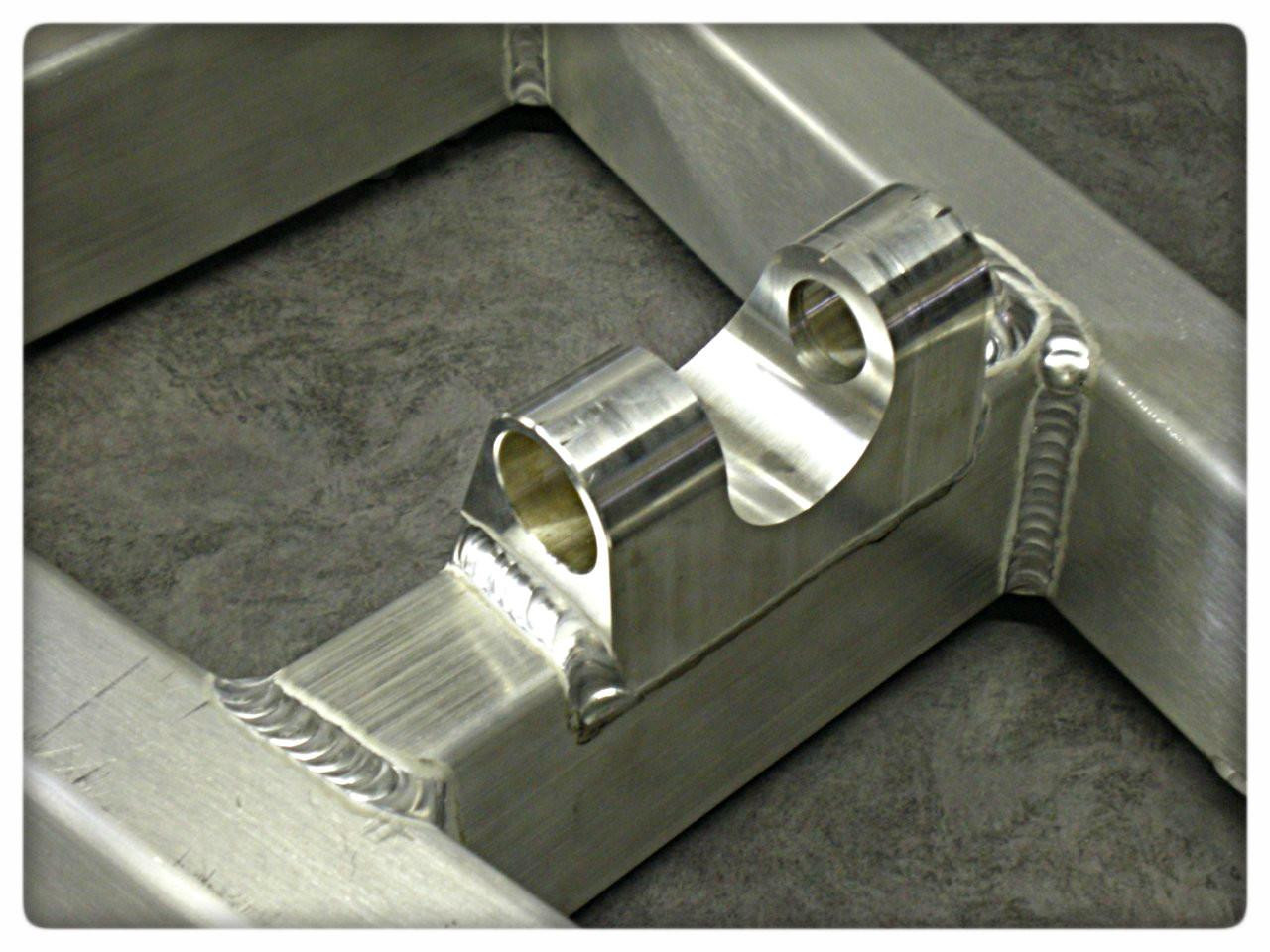 DME Aluminum Swingarm Suzuki GSXR1000 (07-08), close-up view of a durable, polished aluminum swingarm with precise welding for motorcycle enhancement.