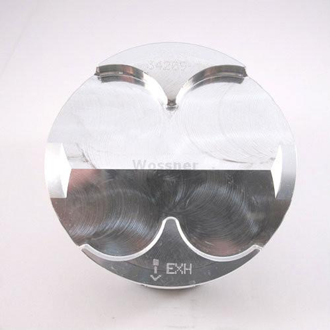 Wossner Piston Kit Honda CBR1000RR (04-15), high-performance motorcycle piston with a sleek metallic finish and precise machining for optimal engine performance. Wossner Piston Kit Honda CBR1000RR (04-15), high-performance motorcycle piston with a sleek metallic finish and precise machining for optimal engine performance.