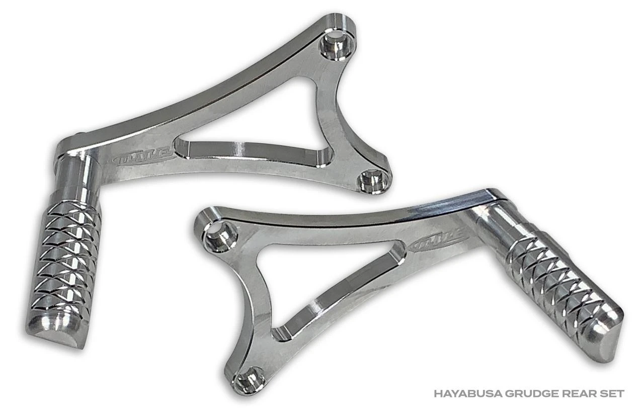 DME Rearsets, Grudge, Suzuki Hayabusa (99-26), silver motorcycle rear sets with adjustable footpegs and modern design.