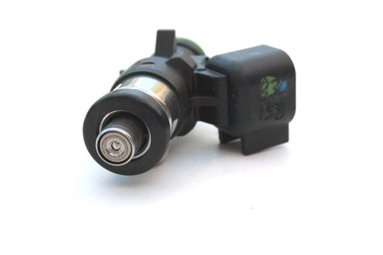 Schnitz Racing Fuel Injector Kit for Kawasaki ZX14R and ZX10R, close-up image of black and silver fuel injector with electronic connector. Schnitz Racing Fuel Injector Kit for Kawasaki ZX14R and ZX10R, close-up image of black and silver fuel injector with electronic connector.