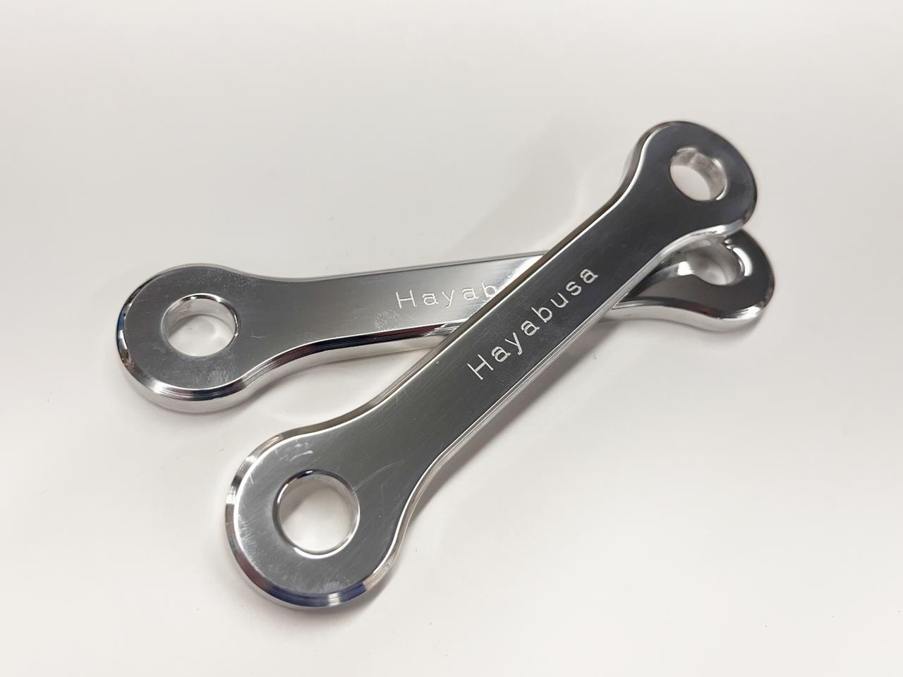 Schnitz Racing Schnitz Raising Link Suzuki Hayabusa (99-26), polished metal motorcycle suspension link with engraved 'Hayabusa' text.