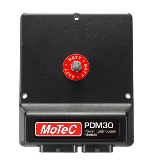 Motec PDM30 Power Distribution Module, black compact electronic device with red BATT nut and MoTeC logo label.