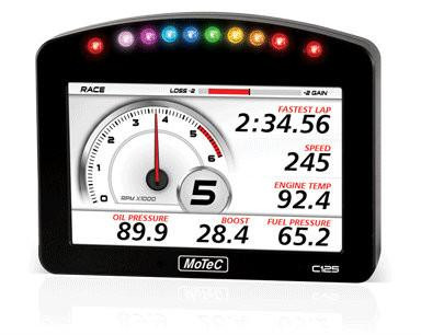 Motec Dash Logger C125, digital dashboard display showing race data including lap times, speed, engine temperature, oil pressure, boost, and fuel pressure with colorful indicator lights.
