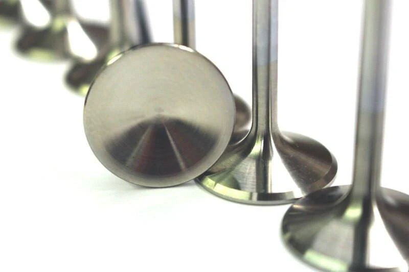 Vance & Hines Titanium Exhaust Valves Suzuki Hayabusa (99-26), close-up of stainless steel and titanium exhaust valves for motorcycle engine performance.