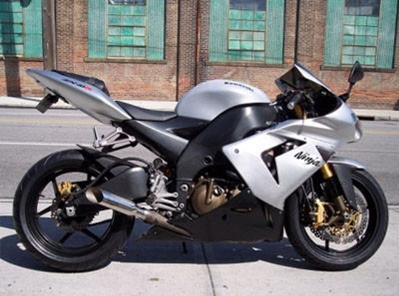VooDoo Shorty Slip On Exhaust Kawasaki ZX10R (04-05), motorcycle with sleek black and silver body and custom exhaust installed.