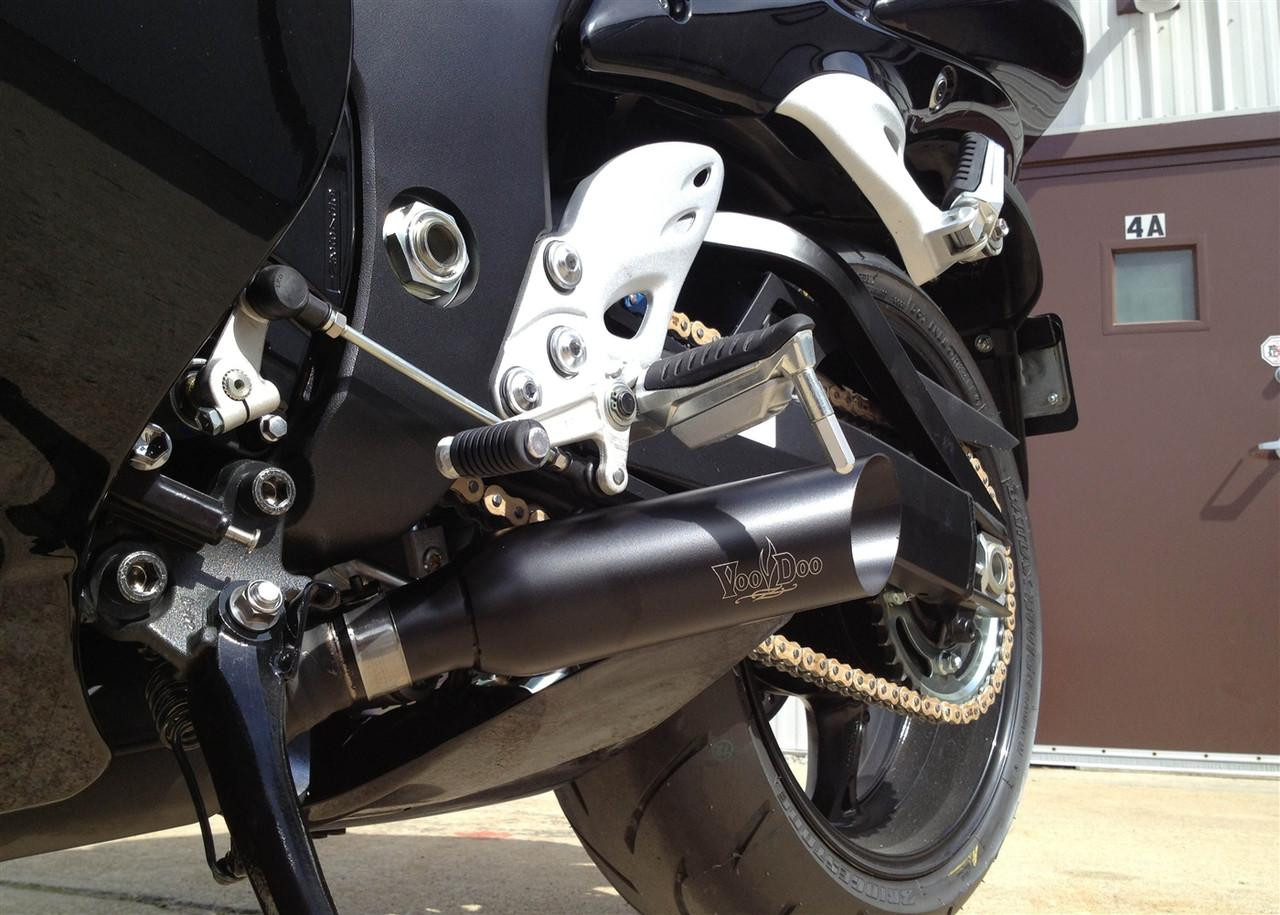 VooDoo Shorty Slip On Exhaust Suzuki GSX1300R Hayabusa (08-20), close-up view of the sleek black motorcycle exhaust system installed on a black sportbike.