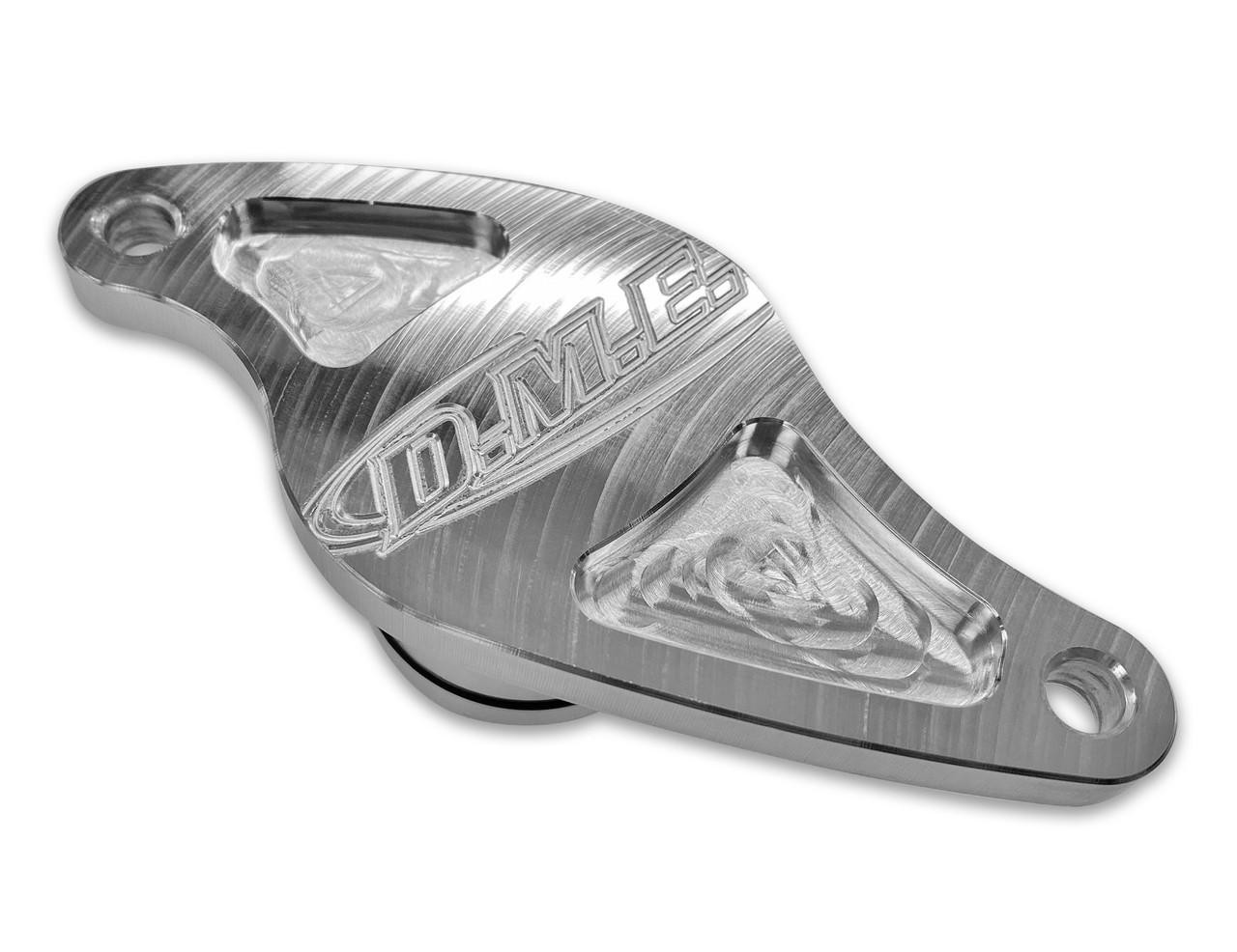 DME Water Pump Block Off Plate Suzuki Hayabusa (99-25), GSXR1000 (01-08), silver aluminum motorcycle engine part with engraved logo. DME Water Pump Block Off Plate Suzuki Hayabusa (99-25), GSXR1000 (01-08), silver aluminum motorcycle engine part with engraved logo.