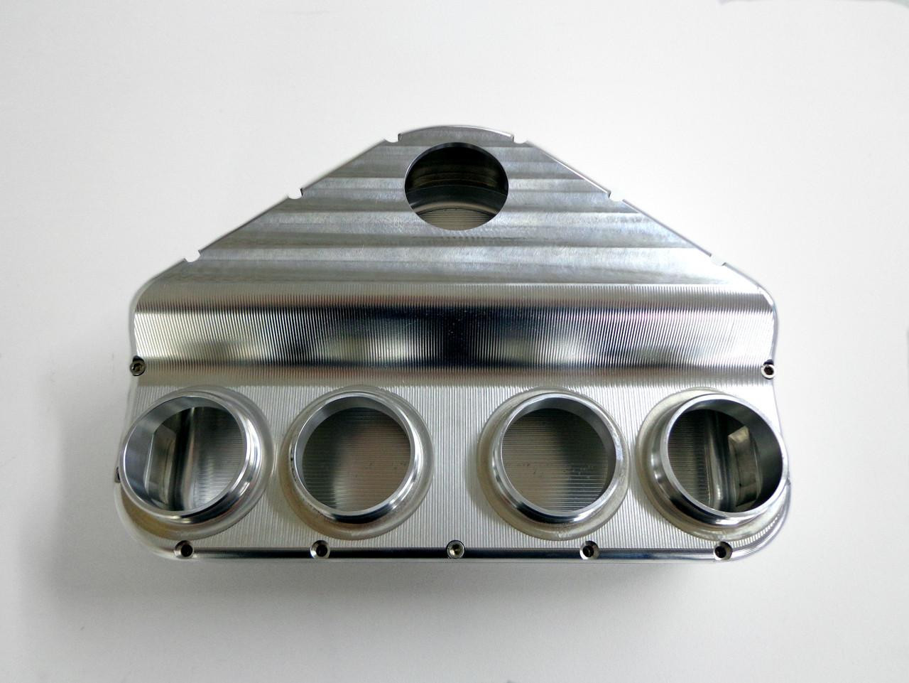 RCC Turbo Billet Aluminum Plenum Suzuki Hayabusa (99-20), front view of polished aluminum motorcycle intake plenum with four circular openings.