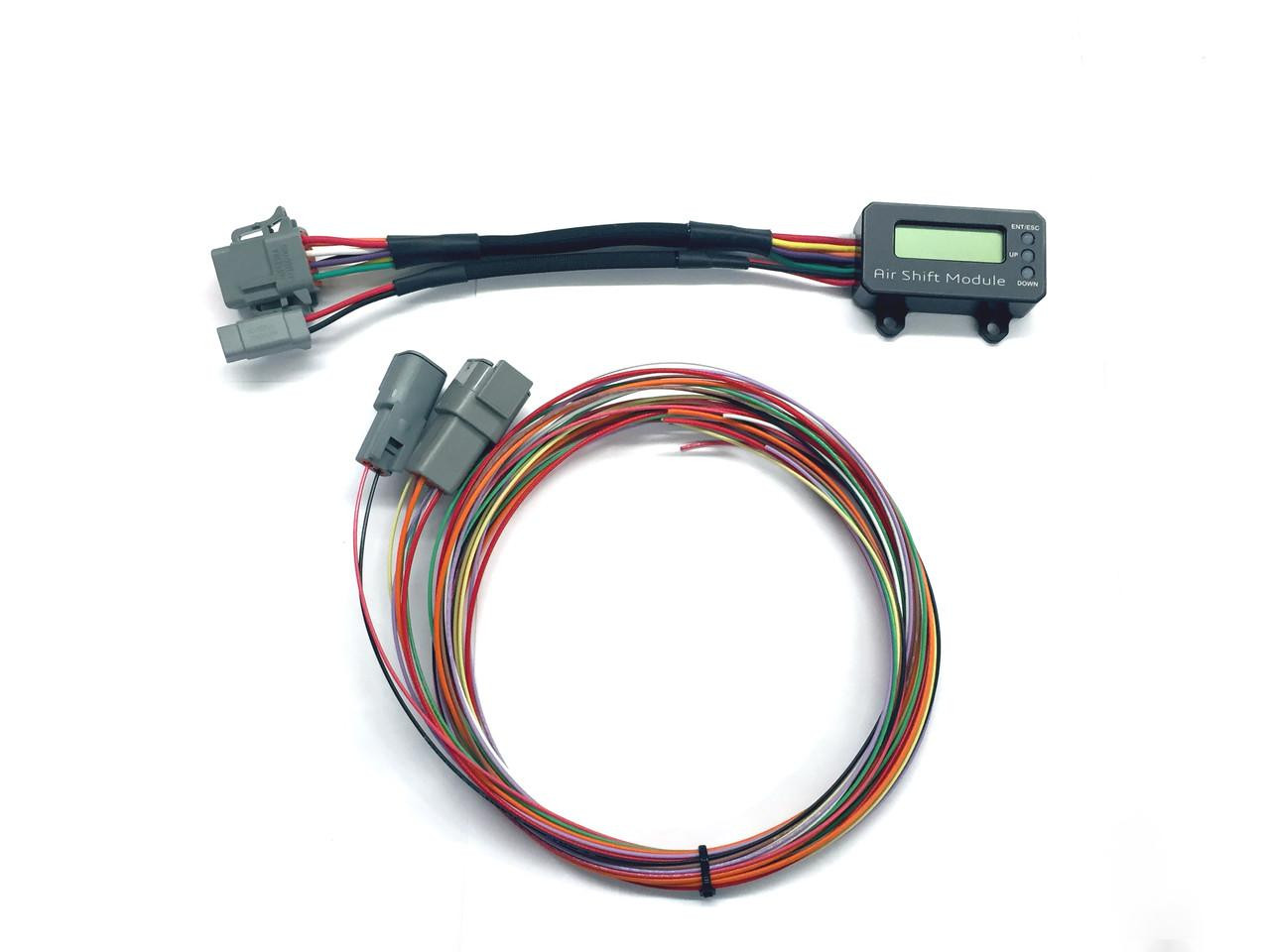 Ryan Schnitz Racing ASM Air Shift Module, a compact electronic control unit with wiring harness for motorcycle gear shifting. Ryan Schnitz Racing ASM Air Shift Module, a compact electronic control unit with wiring harness for motorcycle gear shifting.