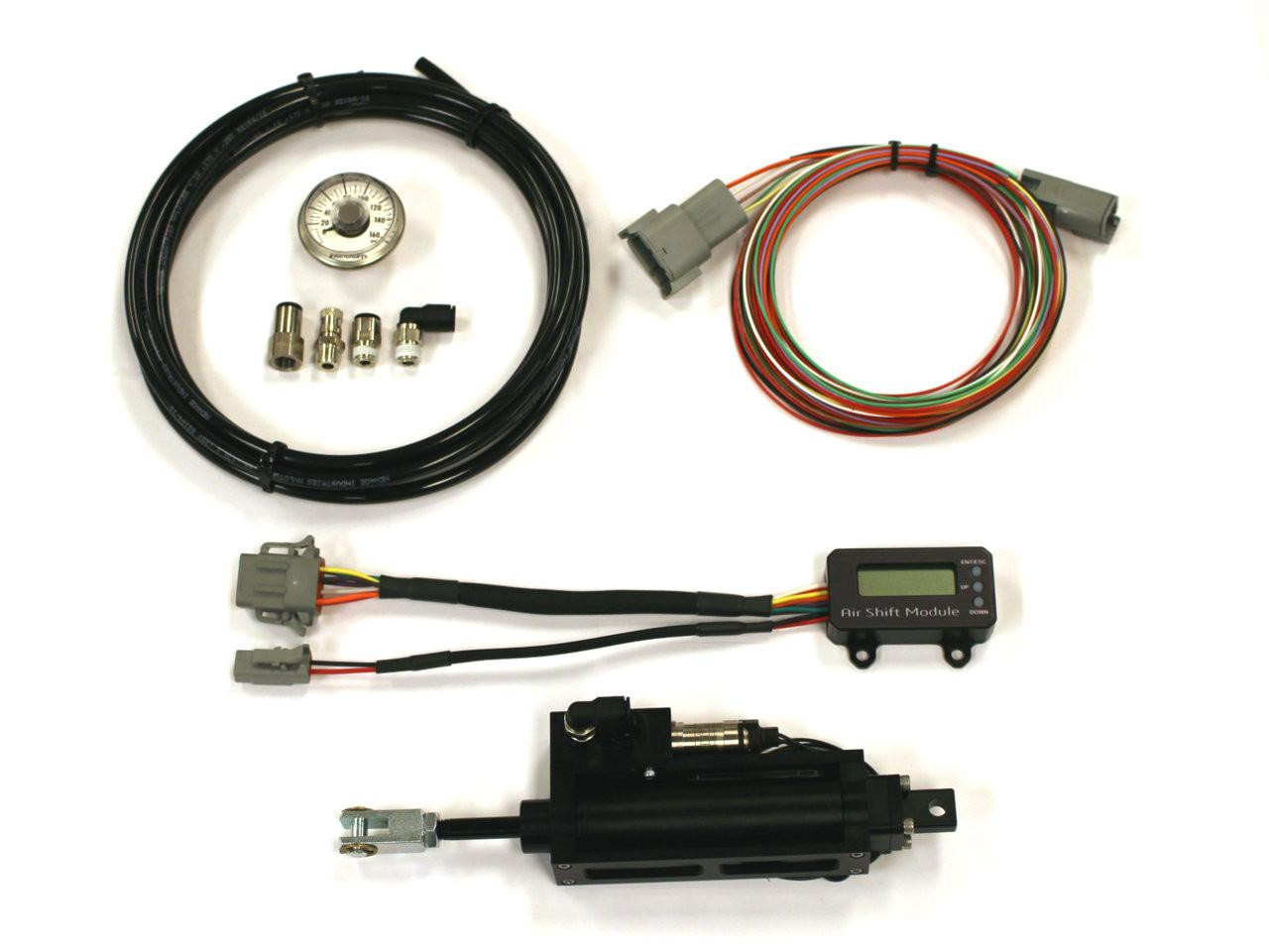 Ryan Schnitz Racing RSR Air Shifter Kit Universal Sport Bike, complete air shifter kit with wiring, air cylinder, gauge, and connectors arranged on a white background.