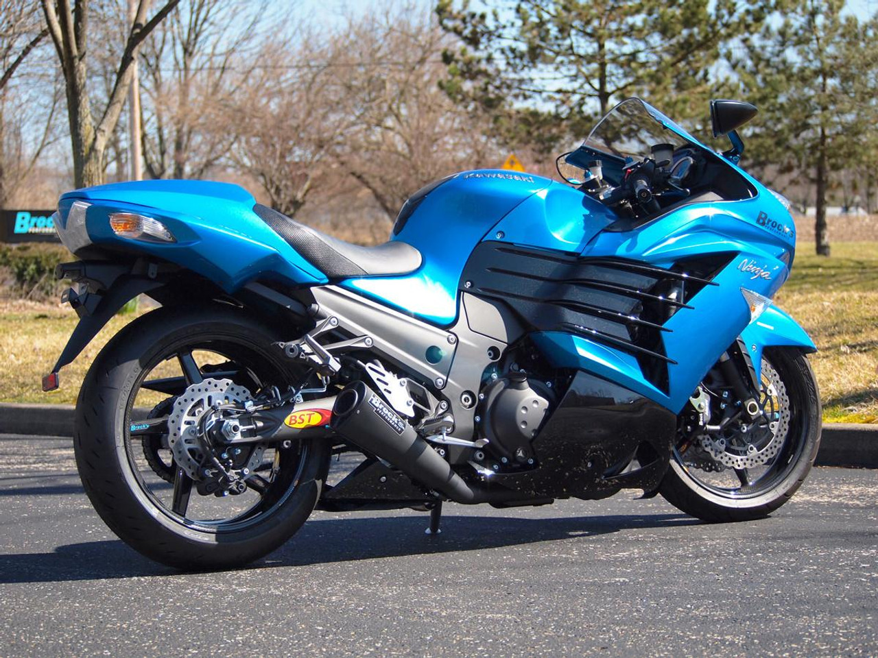 Brocks Performance Brocks Alien Head 2 Full Exhaust 14" Muffler Black Kawasaki ZX14R Motorcycle, blue sportbike with black exhaust system and aerodynamic fairings. Brocks Performance Brocks Alien Head 2 Full Exhaust 14" Muffler Black Kawasaki ZX14R Motorcycle, blue sportbike with black exhaust system and aerodynamic fairings.