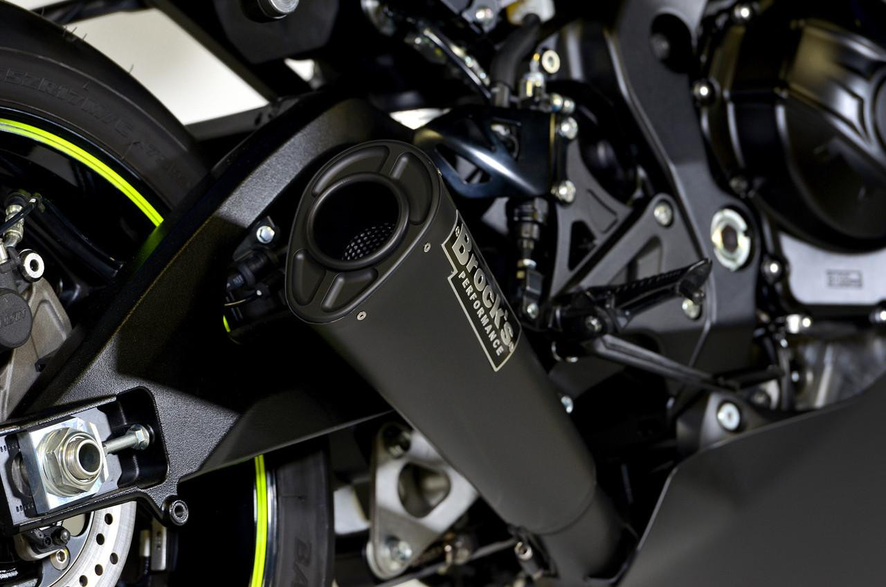 Brocks Performance Brocks Alien Head 2 Full Exhaust 14" Muffler Black Suzuki GSXR1000 (17-25), close-up view of the black exhaust pipe mounted on a motorcycle.