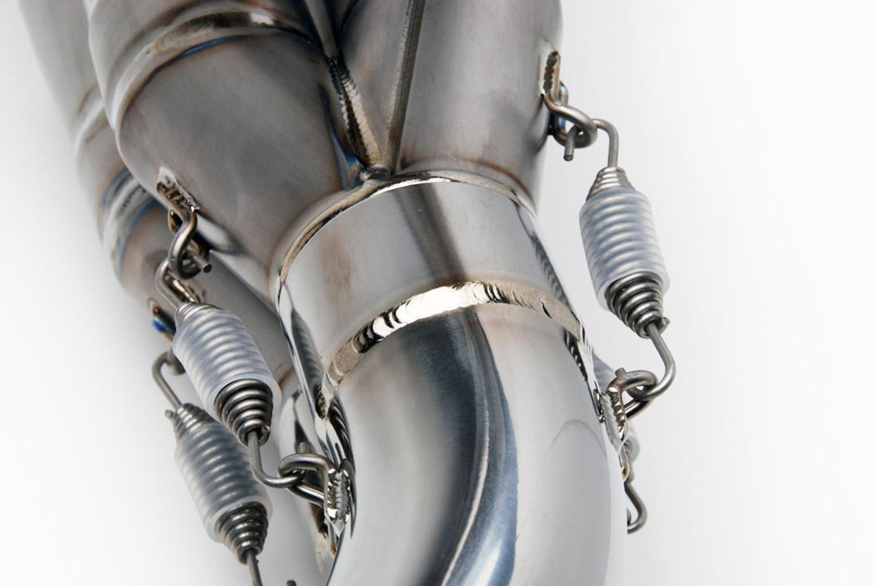 Brocks Performance Brocks Tiwinder Full Exhaust Race Baffle Suzuki GSXR1000 (07-08), close-up of motorcycle exhaust system with metallic finish, race baffle, and coil springs for secure fitment.