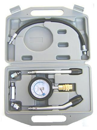 Schnitz Racing Schnitz Engine Compression Test Kit, a portable diagnostic tool set with hoses, pressure gauge, and adapters for testing engine cylinder compression.