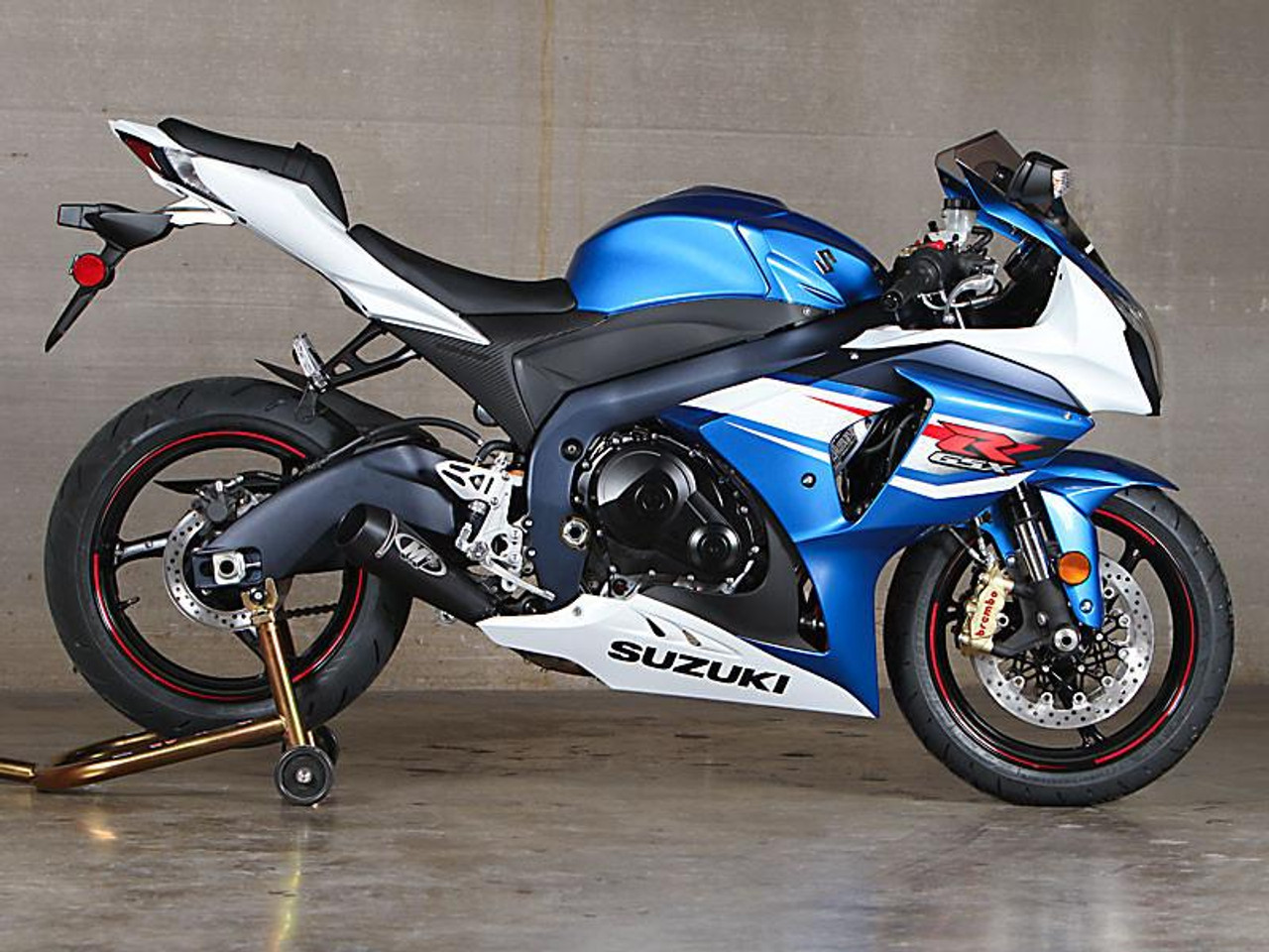 M4 Performance Exhausts M4 GP Black Exhaust Suzuki GSXR1000 (12-16), motorcycle with blue and white fairings and black exhaust system