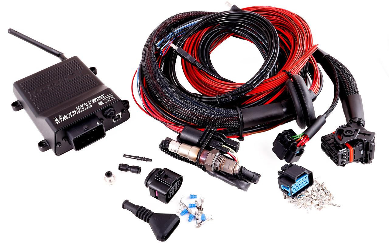 MaxxECU Sport Engine Control Unit, automotive engine management system with wiring harness, connectors, and installation components. MaxxECU Sport Engine Control Unit, automotive engine management system with wiring harness, connectors, and installation components.