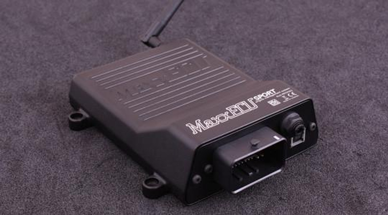 MaxxECU Sport Engine Control Unit, compact black automotive ECU with wiring connector and branding. MaxxECU Sport Engine Control Unit, compact black automotive ECU with wiring connector and branding.