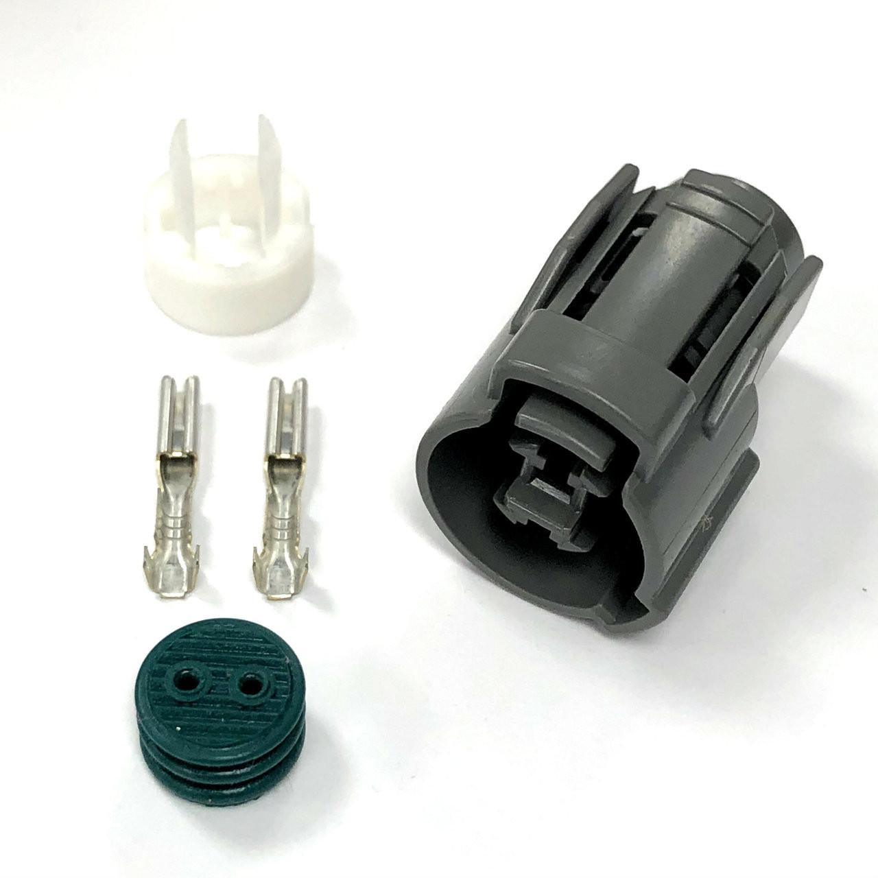 Ryan Schnitz Racing RSR Connector Kit, 2 Way Socket HW-2, with black plastic connector, two metal terminals, white protective cap, and rubber gasket for electrical connection.