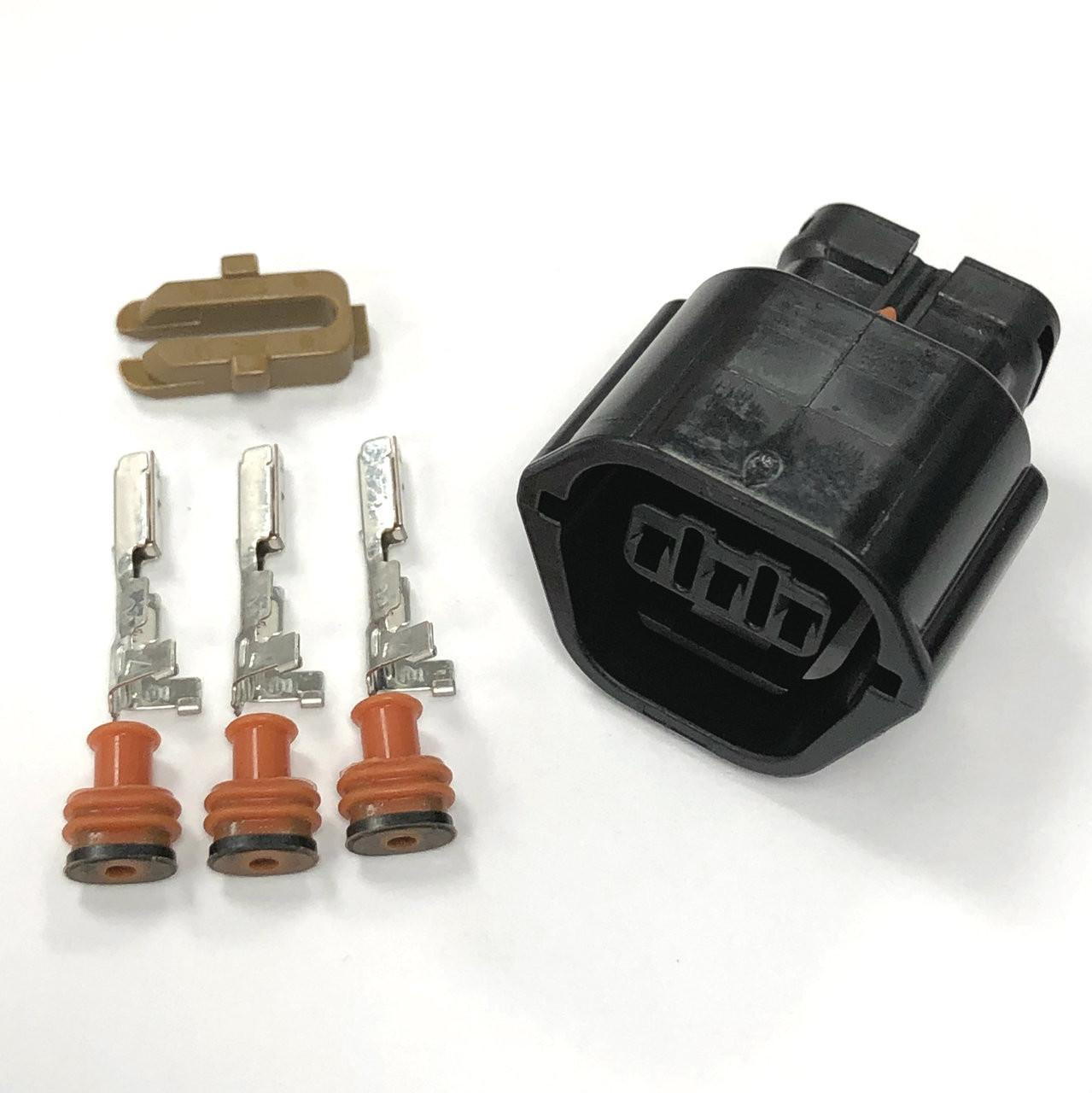 Ryan Schnitz Racing RSR Connector Kit, 3 Way Socket SSD, automotive electrical connector with black housing and metal terminals with orange rubber seals for secure electrical connections.