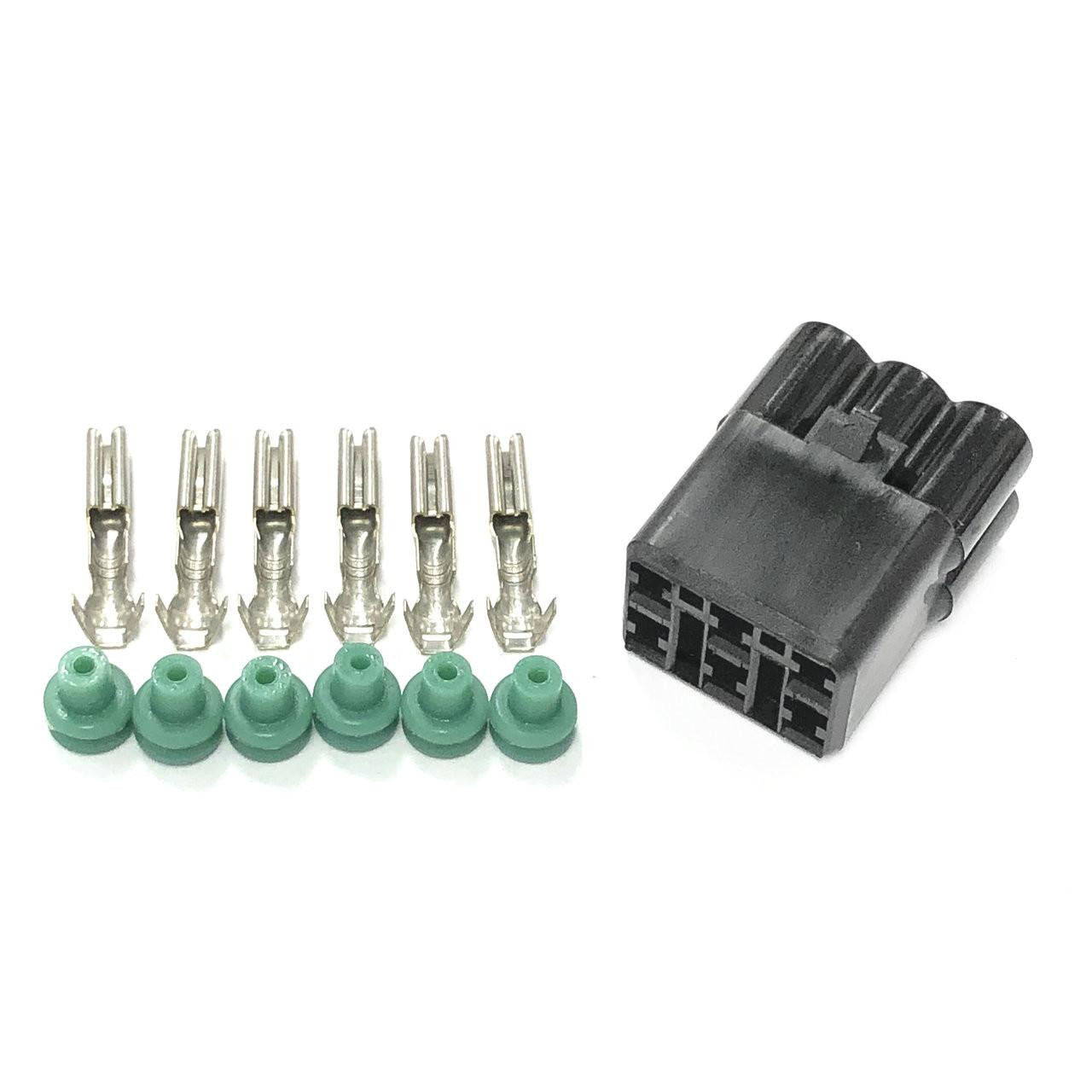 Ryan Schnitz Racing RSR Connector Kit, 6 Way Socket HM, with six metal socket terminals and six green rubber seals for electrical connections.
