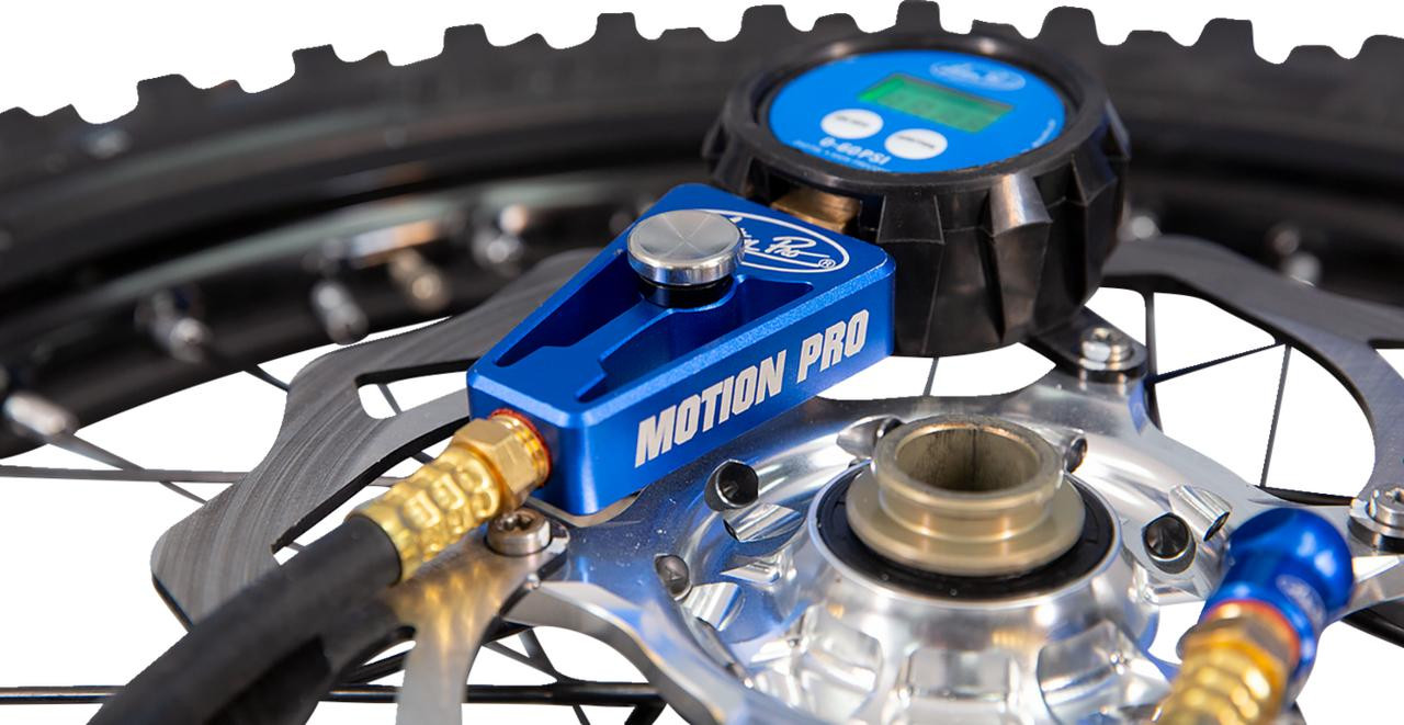 Motion Pro Digital Tire Pressure Gauge 0-60 psi, close-up of the digital tire pressure gauge measuring motorcycle tire pressure with hoses attached.