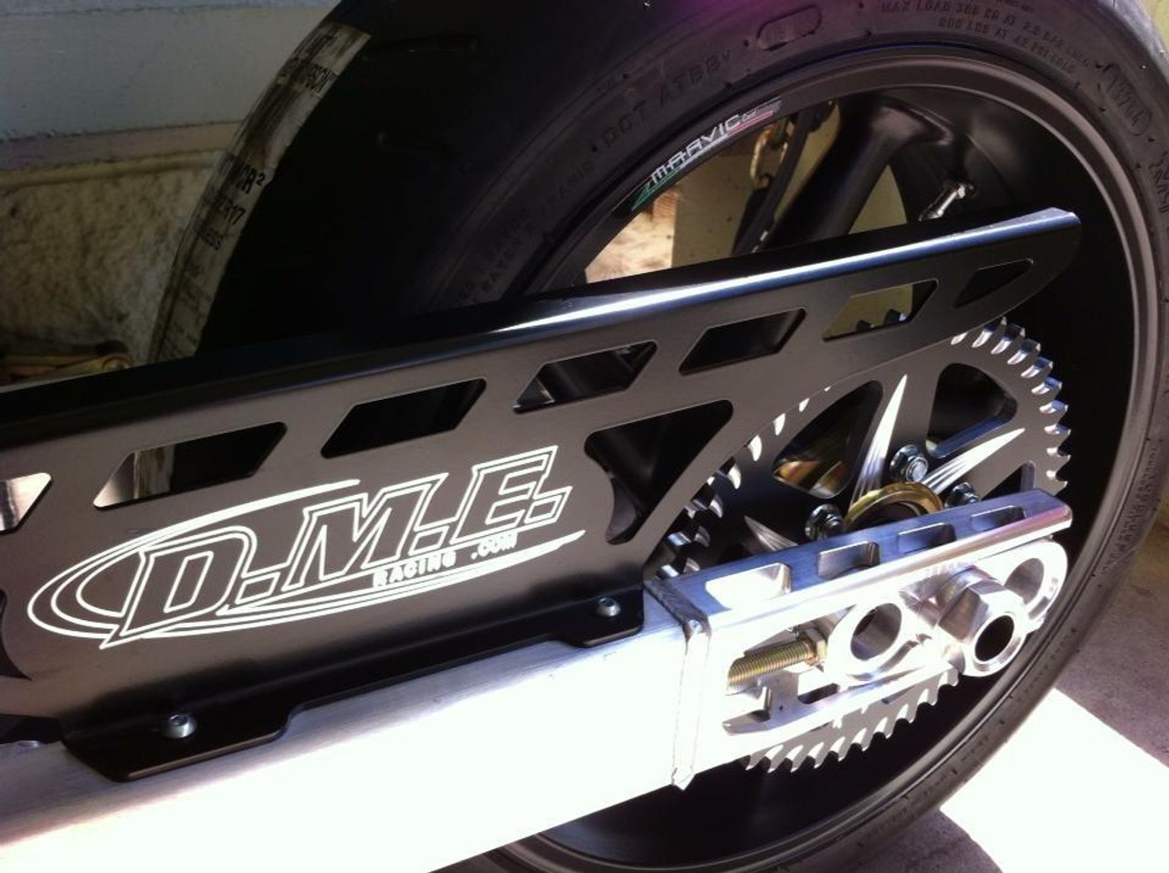 DME Aluminum Swingarm Suzuki GSXR1000 (17-25), close-up view of the black and silver aluminum swingarm with gear sprocket and chain, installed on the motorcycle's rear wheel.