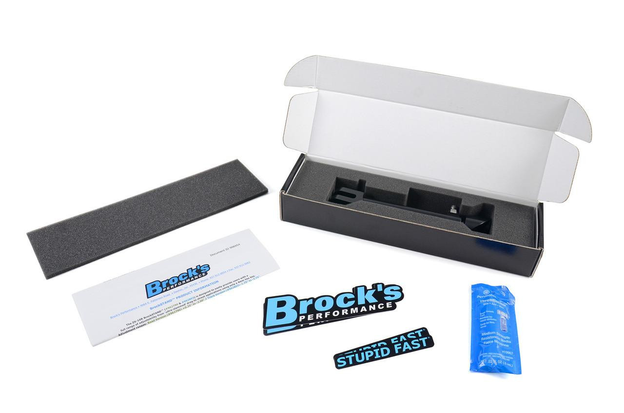 Brocks Performance Brocks Adjustable BrockSTAND Kickstand BMW S1000RR (15-24), product packaging with foam insert, stickers, and installation instructions. Brocks Performance Brocks Adjustable BrockSTAND Kickstand BMW S1000RR (15-24), product packaging with foam insert, stickers, and installation instructions.