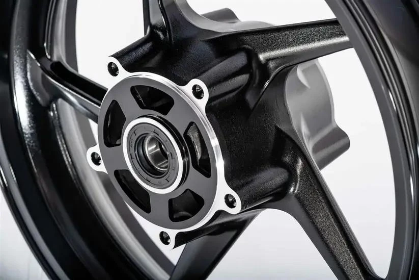 VooDoo Sniper Front Wheel Kawasaki ZX14R (2006-2025), close-up of black motorcycle front wheel with silver hub and bearings.