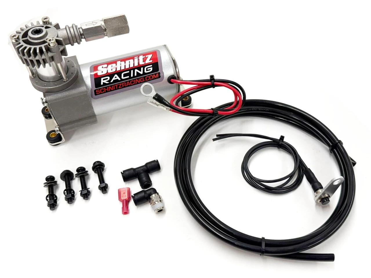 Schnitz Racing Motorcycle Air Compressor Kit, compact air compressor with electrical cord and air hose, includes fastening screws and fittings for motorcycle tire inflation.