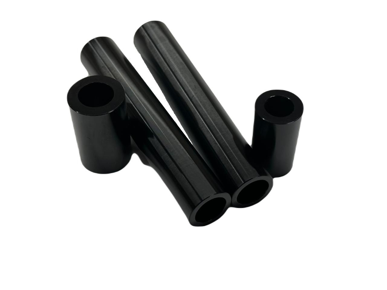 Ironless Innovations Lightweight Swingarm Pivot Link Bearing Sleeves, Suzuki Hayabusa (99-07) 20mm, black cylindrical motorcycle parts.