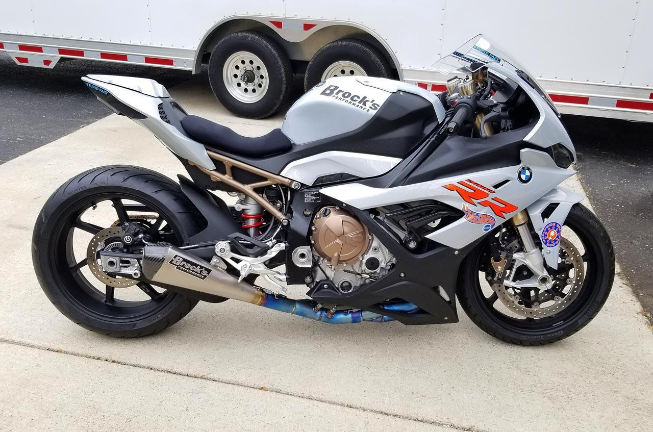 Brocks Performance Brocks CT Megaphone Full System with 17 Inch Muffler on BMW S1000RR motorcycle, high-performance exhaust system with titanium construction and decals.