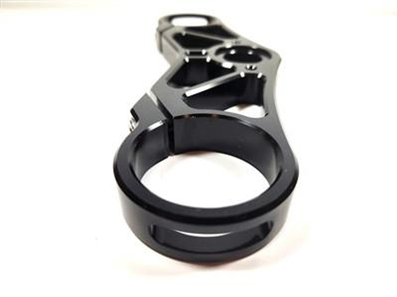 VooDoo Voodoo Top Triple Clamp Suzuki Hayabusa (99-25), black CNC-machined motorcycle part with a sleek design for enhanced handling. VooDoo Voodoo Top Triple Clamp Suzuki Hayabusa (99-25), black CNC-machined motorcycle part with a sleek design for enhanced handling.