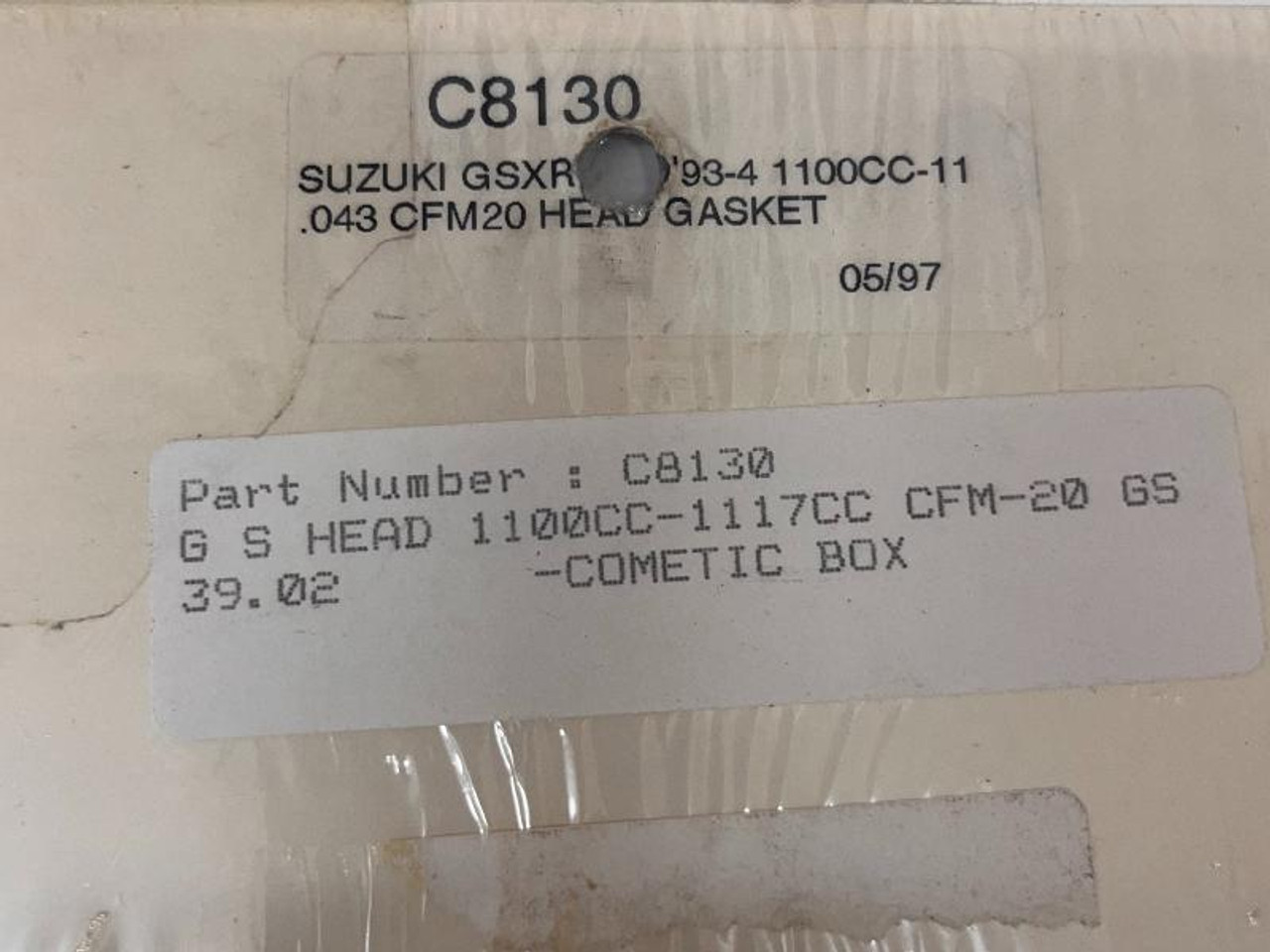 Cometic Head Gasket Suzuki GSXR1100 (93-94), close-up of the product label showing part number C8130 for the Suzuki GSXR 1100CC-11 engine with a .043 CFM20 head gasket, in original packaging. Cometic Head Gasket Suzuki GSXR1100 (93-94), close-up of the product label showing part number C8130 for the Suzuki GSXR 1100CC-11 engine with a .043 CFM20 head gasket, in original packaging.