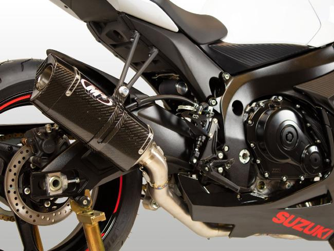 M4 Performance Exhausts M4 Tech1 Carbon Exhaust All Titanium Suzuki GSXR600/750 (11-26), close-up of the high-performance motorcycle exhaust system installed on a Suzuki GSXR sportbike.