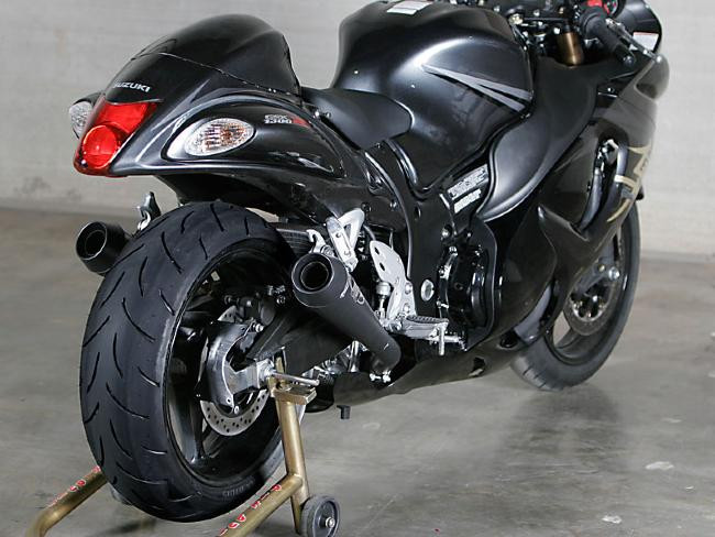 M4 Performance Exhausts M4 Dual Black Retro-Drag Slip Ons Suzuki Hayabusa (08-20), close-up of black motorcycle with dual black exhaust slip-ons installed.