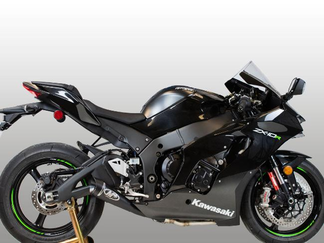 M4 Performance Exhausts M4 GP Black Exhaust Kawasaki ZX-10R (21-25) All Titanium, motorcycle with black and green details, showcasing the high-performance exhaust system on a Kawasaki ZX-10R.