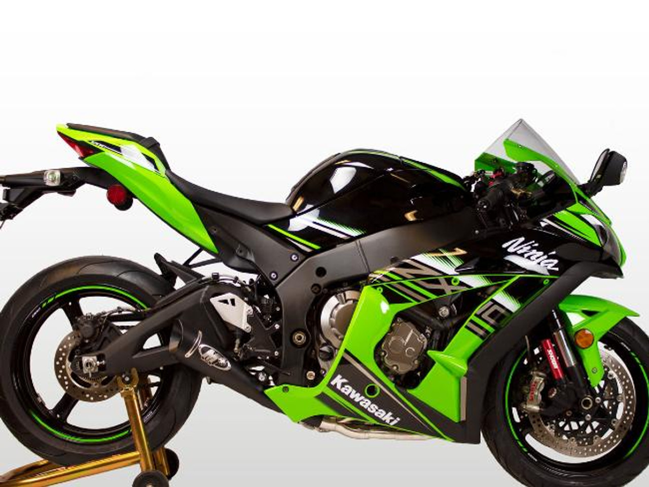 M4 Performance Exhausts M4 GP Black Exhaust Kawasaki ZX-10R (16-20) All Titanium, motorcycle with green and black body, racing design, side view showing exhaust system and front wheel.