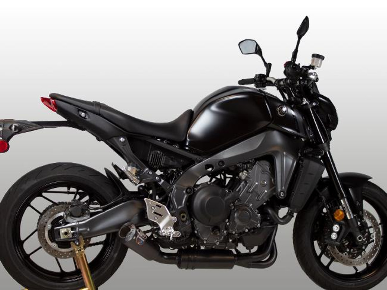 M4 Performance Exhausts M4 Black Exhaust System for Yamaha MT-09/XSR900 (21-25), black motorcycle with performance exhaust system, modern sport bike design.