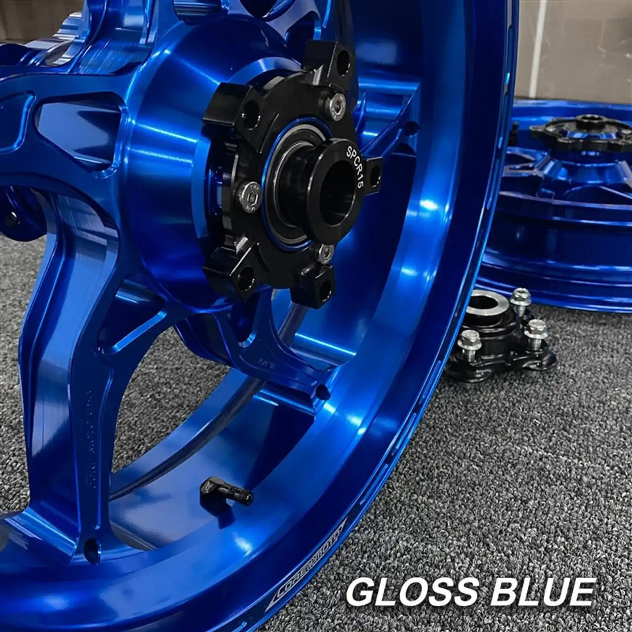 Coremoto Apex-6 Forged Aluminum Wheels Suzuki GSXR1000 (09-16), gloss blue motorcycle wheels with black hub and silver bolts.