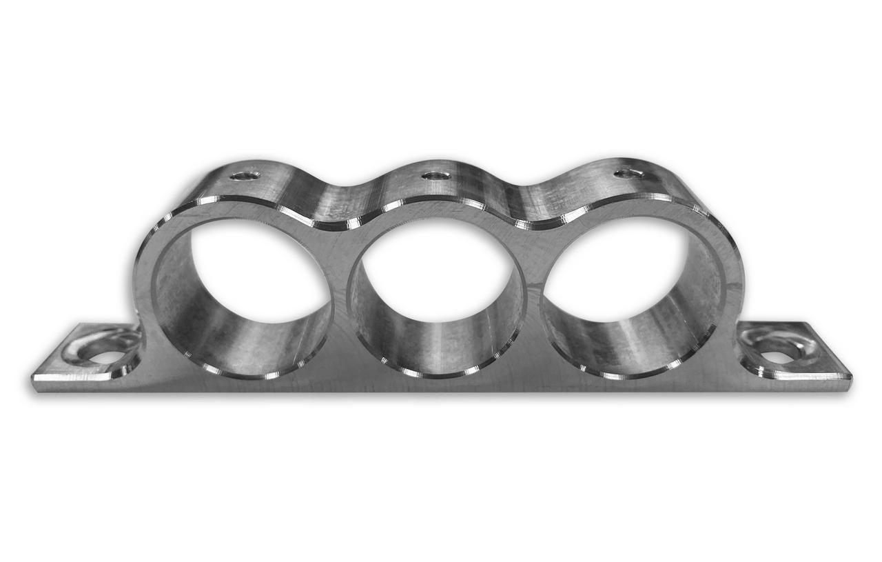 DME Remote Pressure Sensor Mount, metallic pressure sensor mounting bracket with three circular openings for pressure sensors, mounted on a flat base with screw holes.